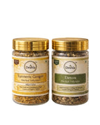 Two jars of Deshla herbal infusions, one Turmeric Ginger and the other Detox, on a white background.