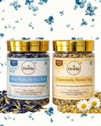 Two jars of Deshla tea with butterfly pea flowers and chamomile flowers on a white background.