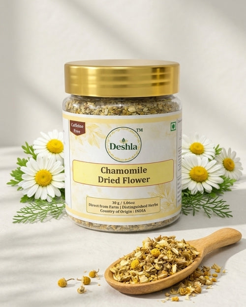 Jar of Deshla Chamomile Dried Flower with a wooden spoon and chamomile flowers on a light background