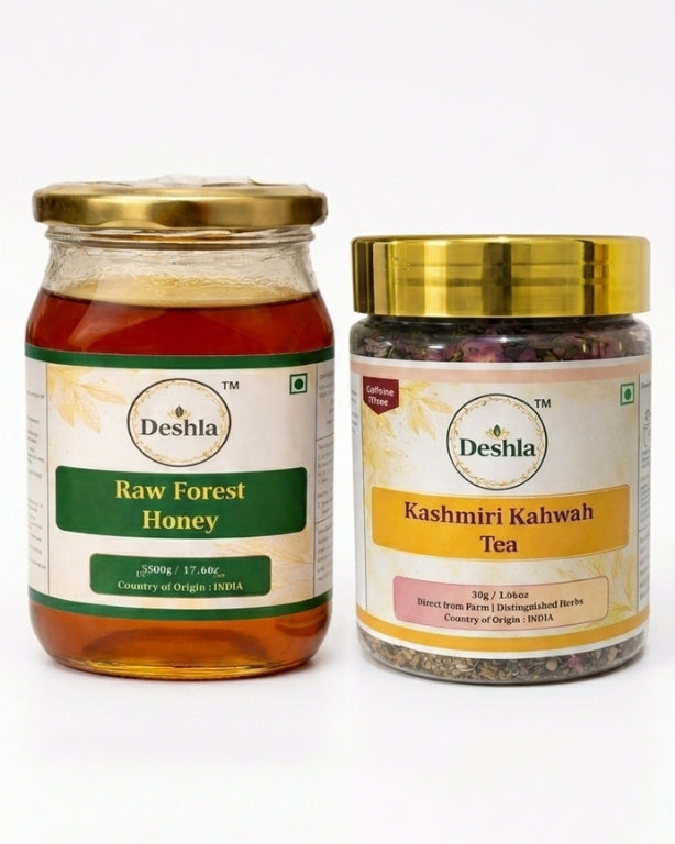 Two jars of Deshla honey and Kashmiri Kahwah tea on a white background