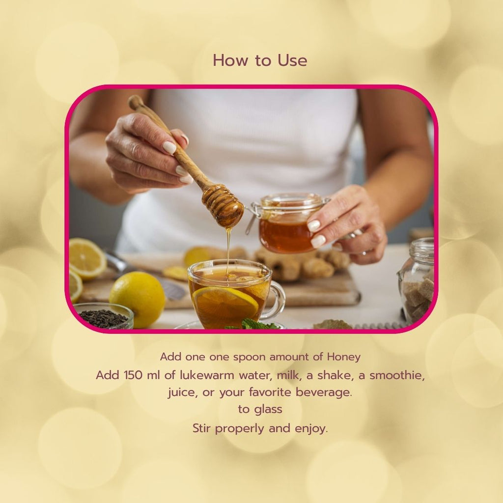 Person pouring honey into a glass of tea with lemons and spices on a blurred background.