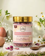 Jar of Deshla Rose Flower Petals Tea with a gold lid on a decorative background with flowers and eggs.